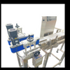 Checkweigher for Bottles with Clamping Mechanism 